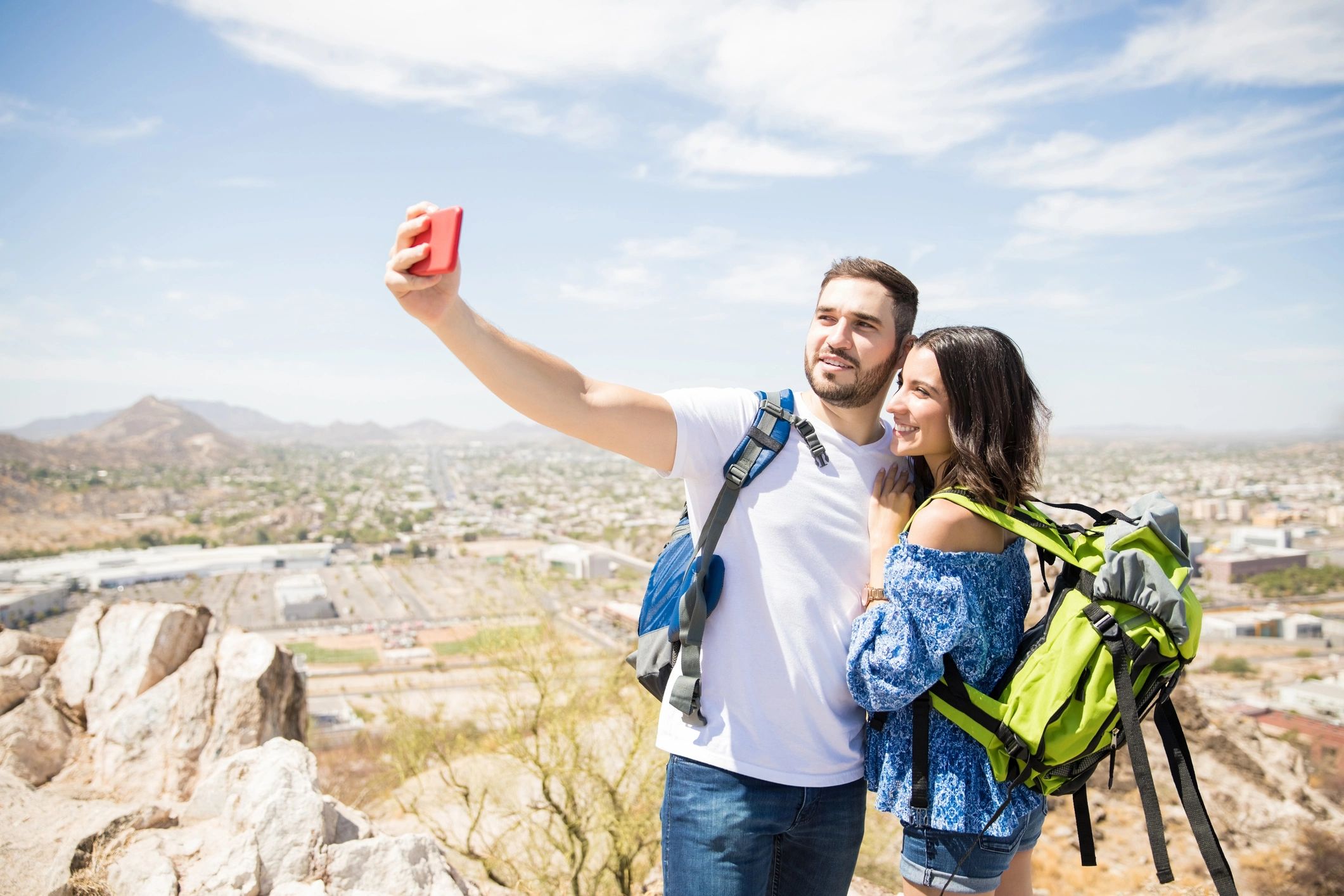 Man taking a picture of him and his